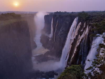 Buy Sunset over Magnificent Victoria Falls, One of Natural Wonders of World at AllPosters.com