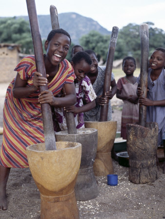 Buy Cheerful Young Girls Pound Corn Outside Families' Homes Near Monkey Bay, South End of Lake Malawi at AllPosters.com
