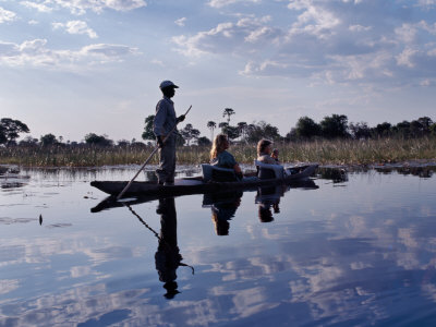 Mokoro Dug-Out Canoe Takes Tourists Along One of Myriad Waterways of Okavango Delta