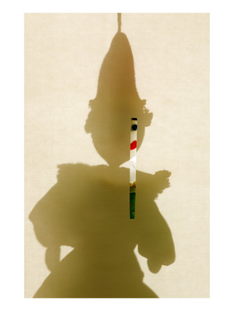 Silhouette of a Sock Puppet Peeking Through a Screen