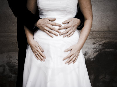 Wedding Couple with Groom's Hands on Brides Stomach