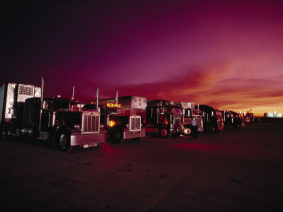 Buy Vivid Sunset over Trucks Parked in a Truck Stop Near Sayre, Oklahoma at AllPosters.com