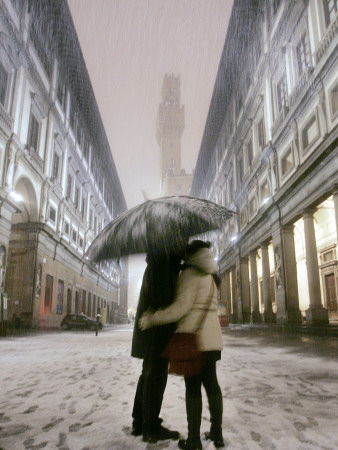 Couple Kiss Each Other During a Snowfall in Florence, Italy