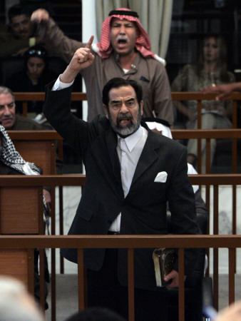 Former Iraqi President Saddam Hussein Berates the Court During their Trial in Baghdad