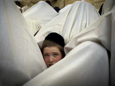 Jewish Men Participate in a Blessing During the Jewish Holiday of Passover at the Western Wall