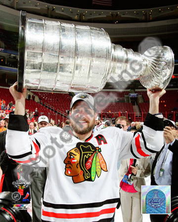 Patrick Sharp with the 2009-10 Stanley Cup Poster
