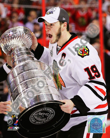 Jonathan Toews with the 2009-10 Stanley Cup Poster