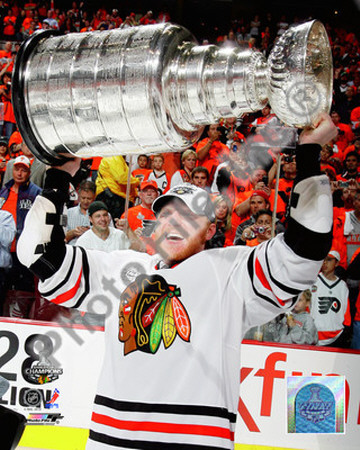 Marian Hossa with the 2009-10 Stanley Cup Poster