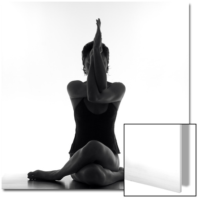 Woman Sitting with Legs and Arms Entwined