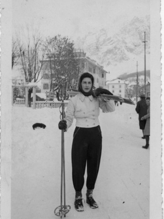 A Woman with Her Skis in Italy