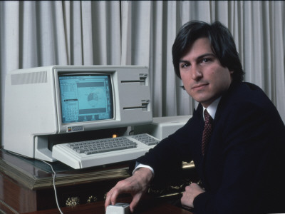 Apple Computer Chrmn. Steve Jobs with New Lisa Computer During Press Preview