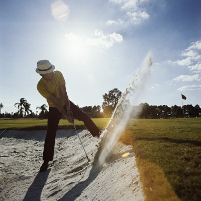 Golfer Hitting Ball Out of Sand Trap Poster