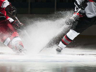 Ice Hockey Players Facing Off Poster