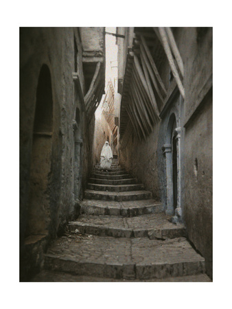 Buy A Muslim Woman Walking Down a Steep Stairway at AllPosters.com