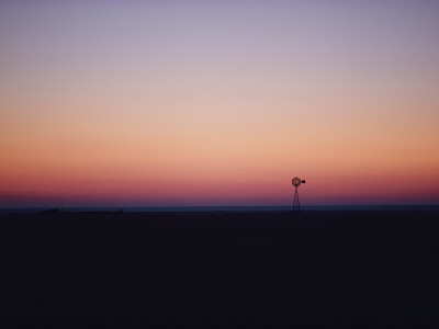 Buy A Solitary Windmill Breaks the Flat Horizon of Dawn at AllPosters.com