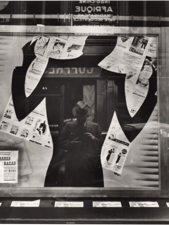 Buy Photographer's Reflection in a Cut-Out Silhouette in a Window at AllPosters.com