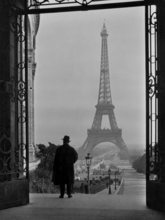 Man Looking Out on the Eiffel Tower