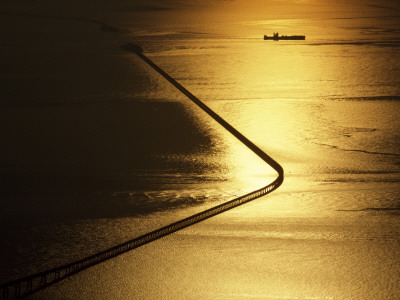 Buy As Evening Yields its Last Light, a Lone Freighter Enters the Bay at AllPosters.com