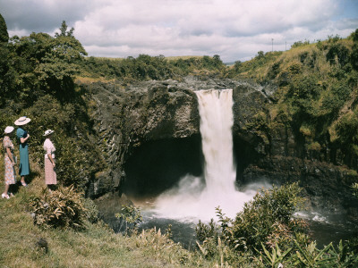 Three Women Watch the Rushing Waters of Rainbow Falls