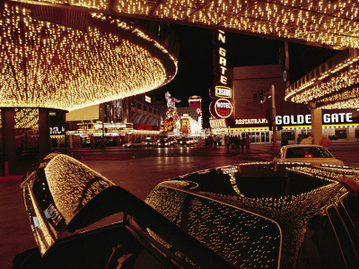 Buy A Las Vegas Hotel's Neon Lights are Reflected on a Parked Car at AllPosters.com