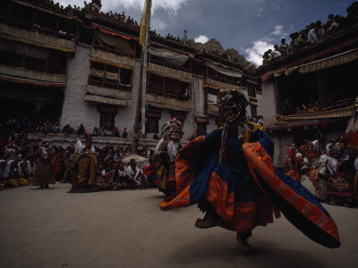 Crowds Gather to Watch Masked Celebrants Whirl in Ritual Dances