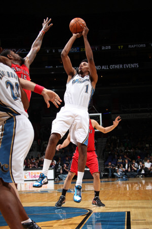 Toronto Raptors v Washington Wizards: Nick Young and Amir Johnson