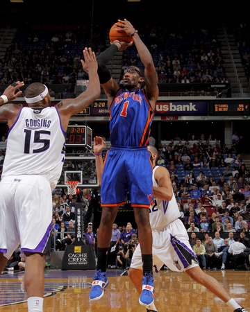 New York Knicks v Sacramento Kings: Amare Stoudemire and DeMarcus Cousins Poster