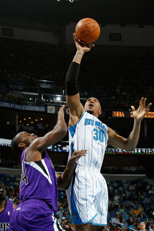 Sacramento Kings v New Orleans Hornets: David West and Carl Landry