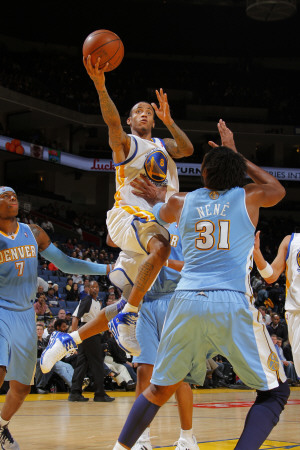 Denver Nuggets v Golden State Warriors: Monta Ellis and Nene