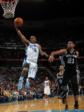 San Antonio Spurs v New Orleans Hornets: Marcus Thornton and Tim Duncan