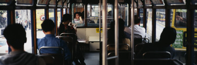 Group of People Traveling in a Tram, Hong Kong, China