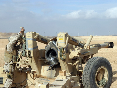 US Marines Prepare to Fire a Howitzer Near Baghdad, Iraq, January 6, 2007