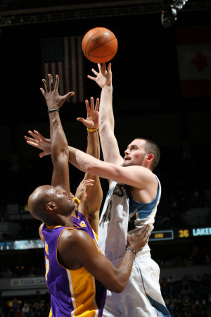 Buy Los Angeles Lakers v Minnesota Timberwolves, Minneapolis, MN - March 1: Kevin Love and Lamar Odom at AllPosters.com