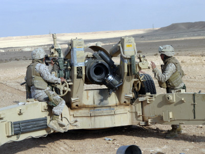 US Marines Prepare to Fire a Howitzer Near Baghdad, Iraq, January 6, 2007