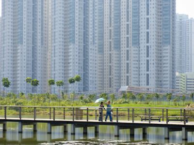 People on Walking Trail Through the Hong Kong Wetland Park, Tin Shui Wai, New Territories