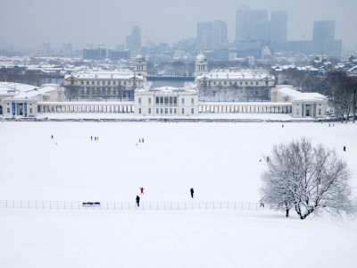 Maritime Museum, Royal Naval College and Canary Wharf Covered in Snow, from Greenwich Park