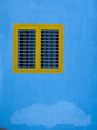Yellow Window on Blue Wall
