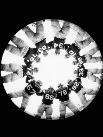 American Football Players in Huddle Poster