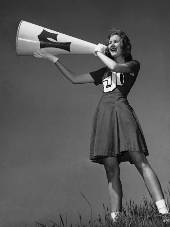 Female Cheerleader Using Megaphone Poster