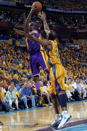 Los Angeles Lakers v New Orleans Hornets, New Orleans, LA - APRIL 22: Lamar Odom and Carl Landry