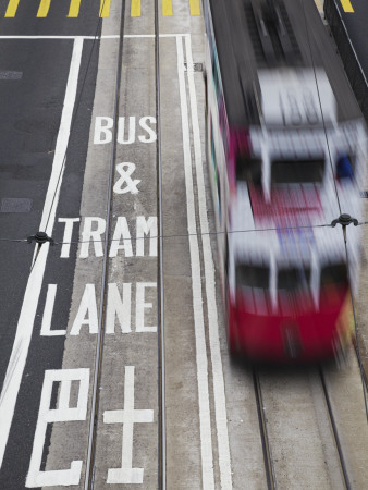 Tram Passing Along Des Voeux Road Central, Central, Hong Kong, China