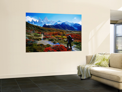 Trekkers Walking Through Autumnal Foliage Towards Monte Fitz Roy Poster