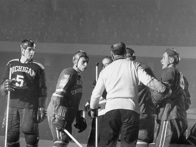 Coll. Hockey: Bu Joe Folino Arguing with Ref.About a Penalty