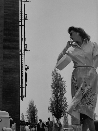 Woman Looking at Sculpture by Artist Bernard Rosenthal
