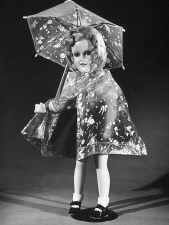 A Baby Doll's Pilofilm Raincoat and Umbrella Being Sold at F.A.O. Schwarz