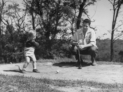 Two Year Old Golfer Bobby Mallick Taking a Swing Poster