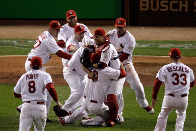 Game 7 - Rangers v Cardinals, St Louis, MO - Oct. 28: Jason Motte, Yadier Molina and David Freese