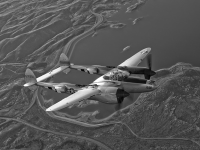 A Lockheed P-38 Lightning Fighter Aircraft in Flight Photographic Print