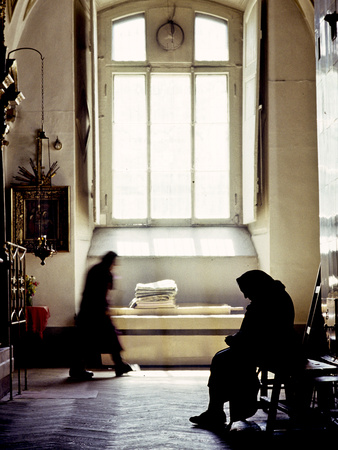 A Women Spends a Quiet Moment in One of Kiev
