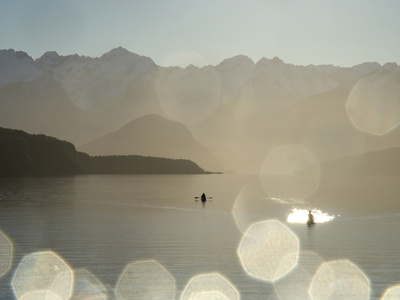 Kayakers Paddle in Glassy Calm Conditions on Lake Manapouri